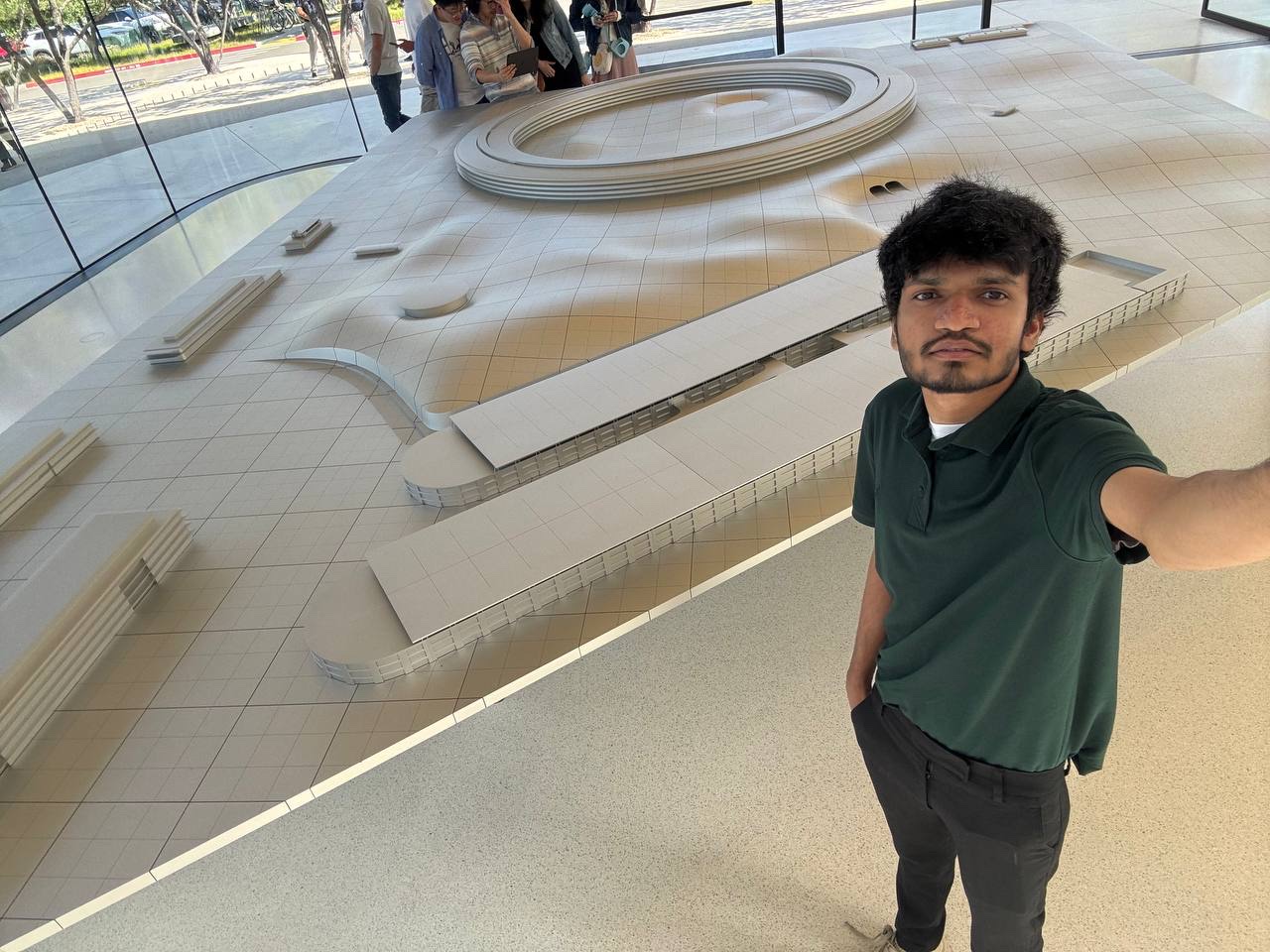 Khush Patel with the Apple Park campus model at the Apple Park Visitor Center, Cupertino